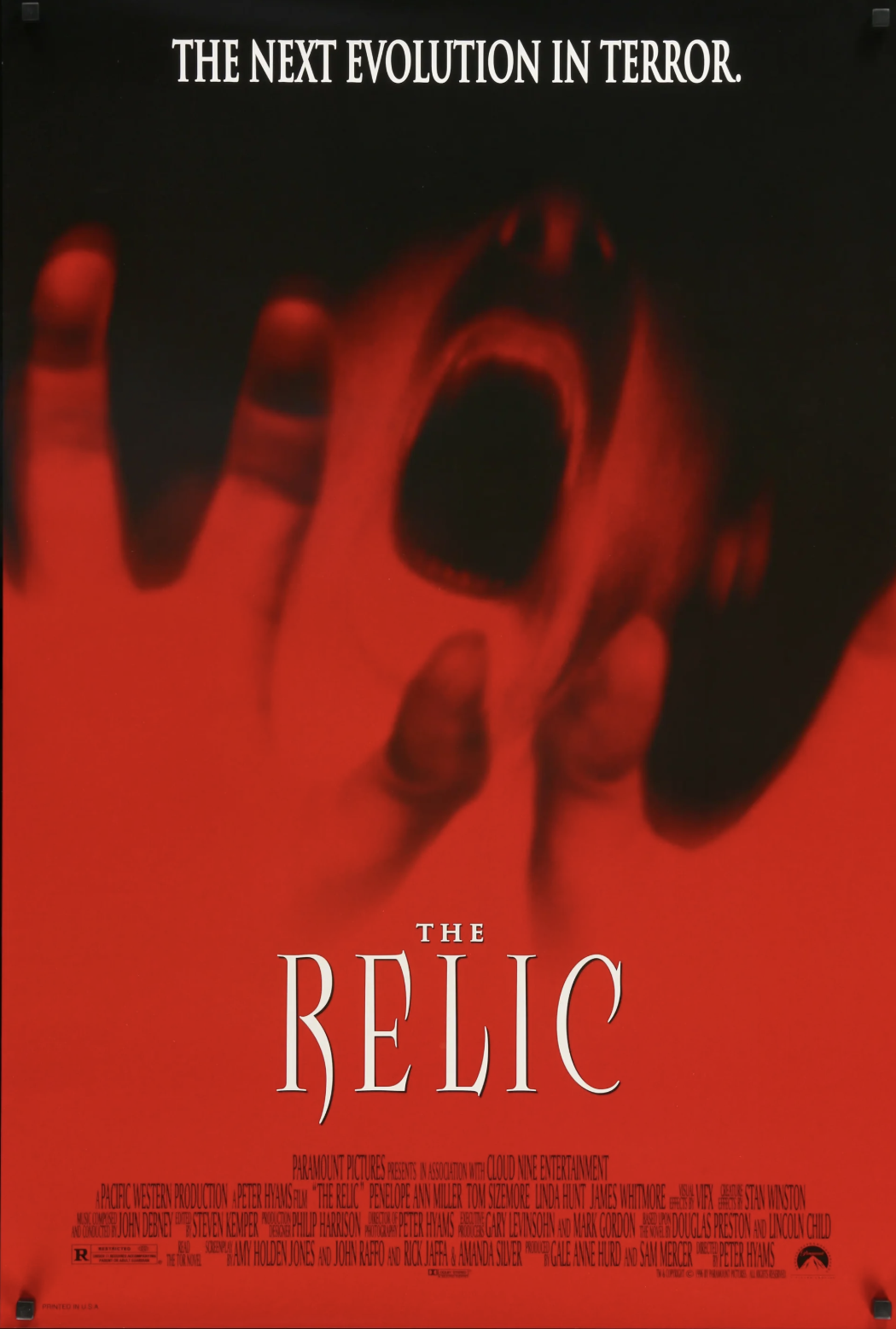 The Relic poster showing a red hand rising from darkness