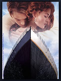 Rose and Jack above the bow of Titanic in the original key art